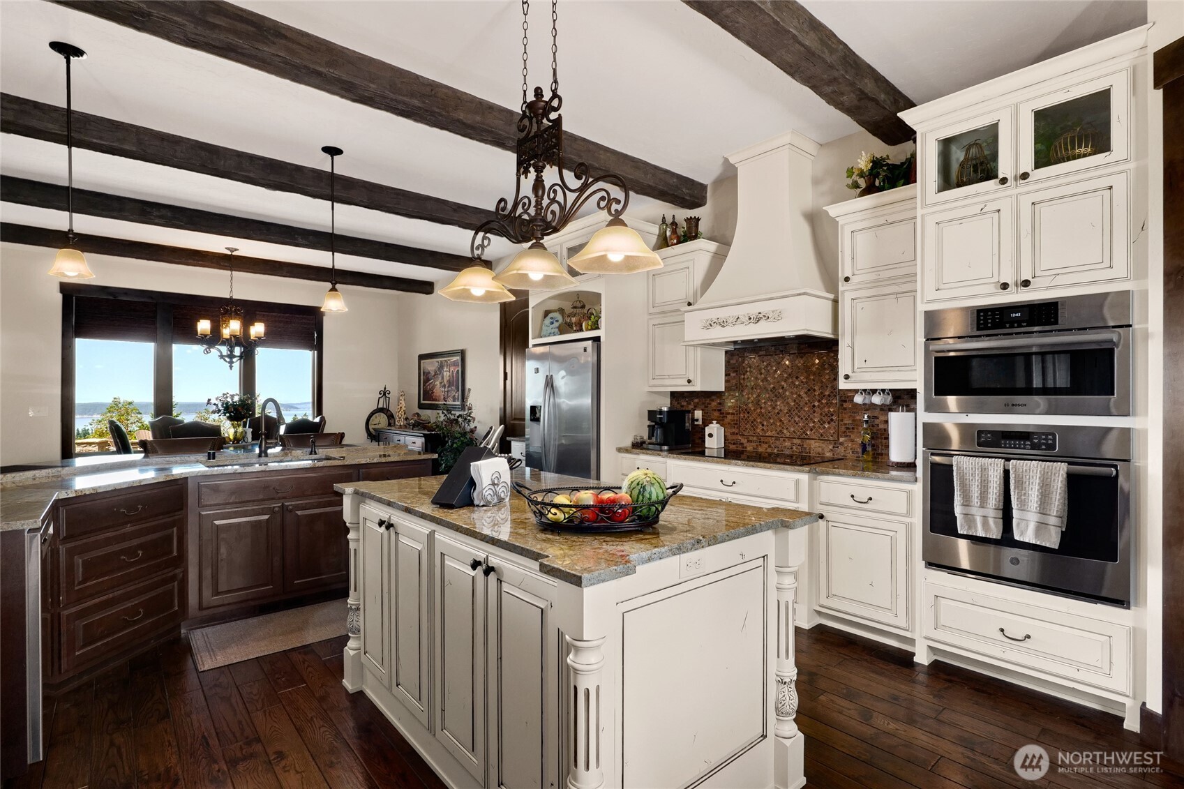 67 North Gilbertson Road Camano Island, WA 98282 - Photo 11 of 40 a kitchen with stainless steel appliances granite countertop a stove and a sink