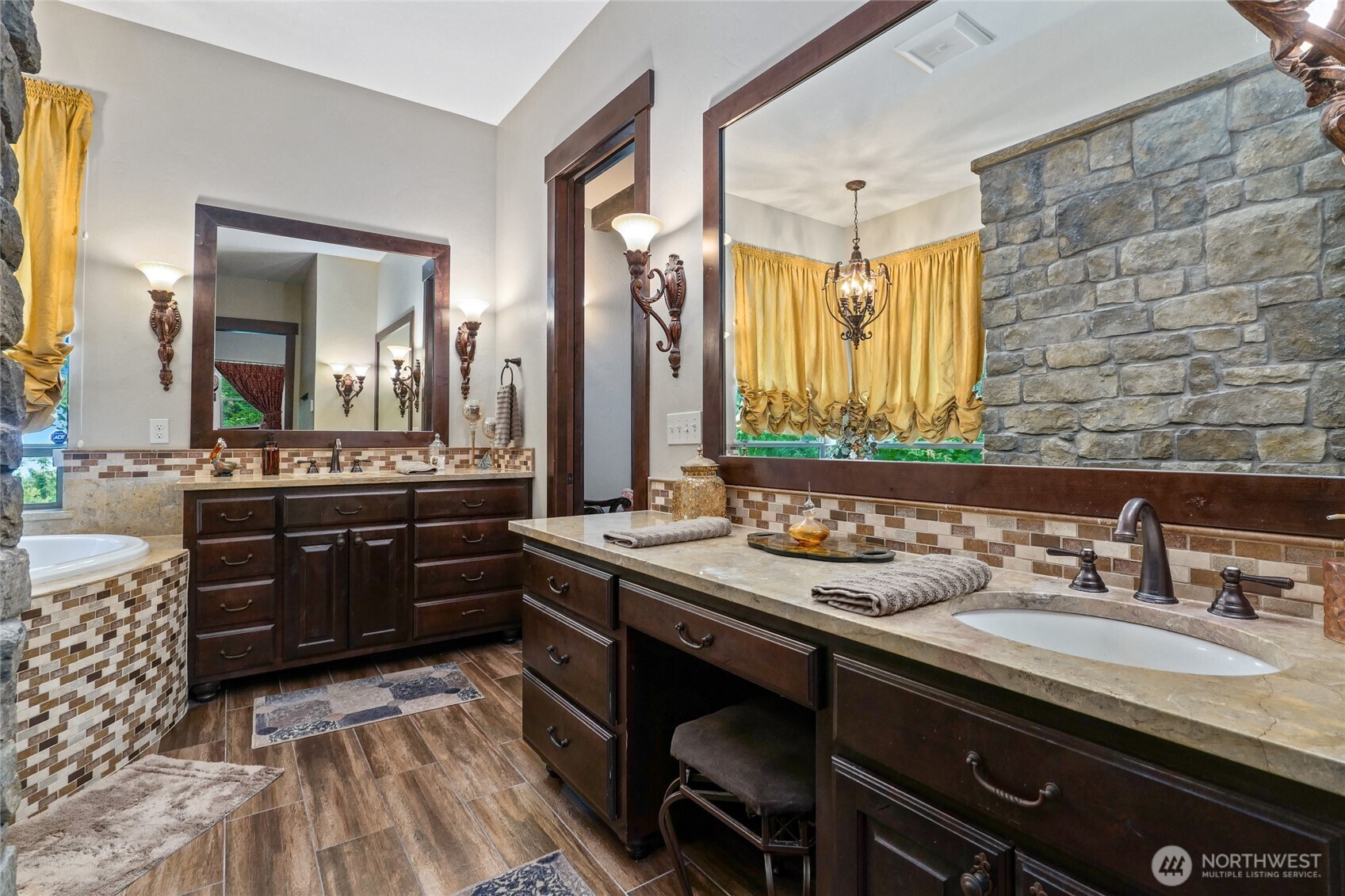 67 North Gilbertson Road Camano Island, WA 98282 - Photo 19 of 40 a bathroom with a sink a vanity and a mirror