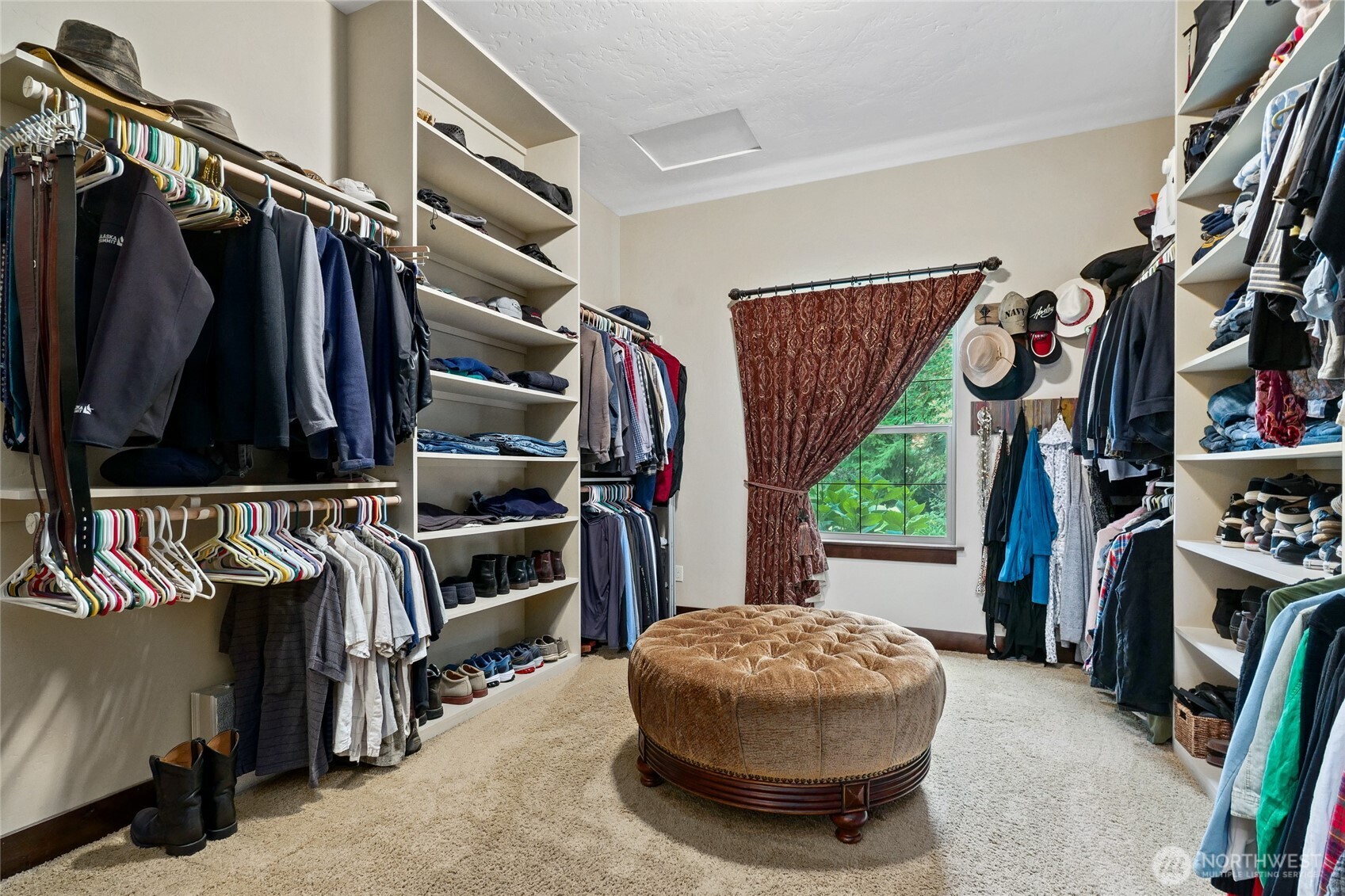 67 North Gilbertson Road Camano Island, WA 98282 - Photo 22 of 40 a view of walk in closet with clothes and shoes