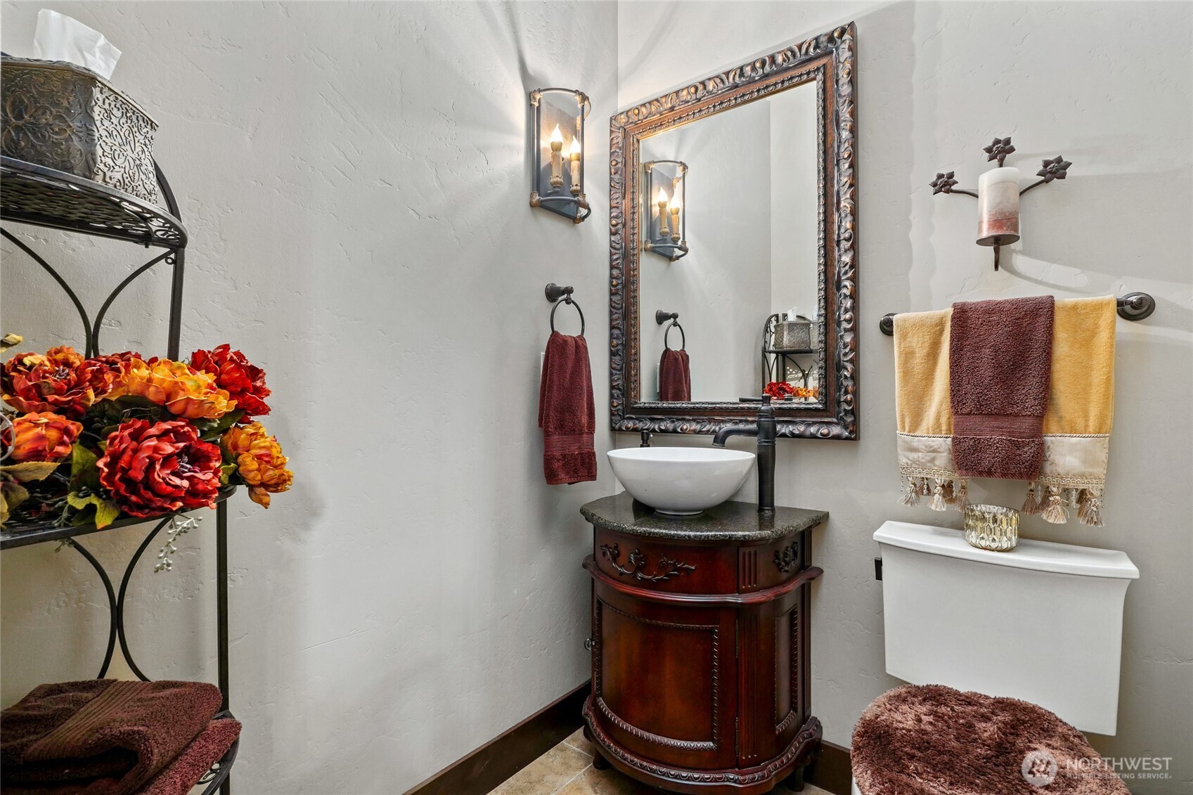 67 North Gilbertson Road Camano Island, WA 98282 - Photo 24 of 40 a bathroom with a sink toilet and a mirror