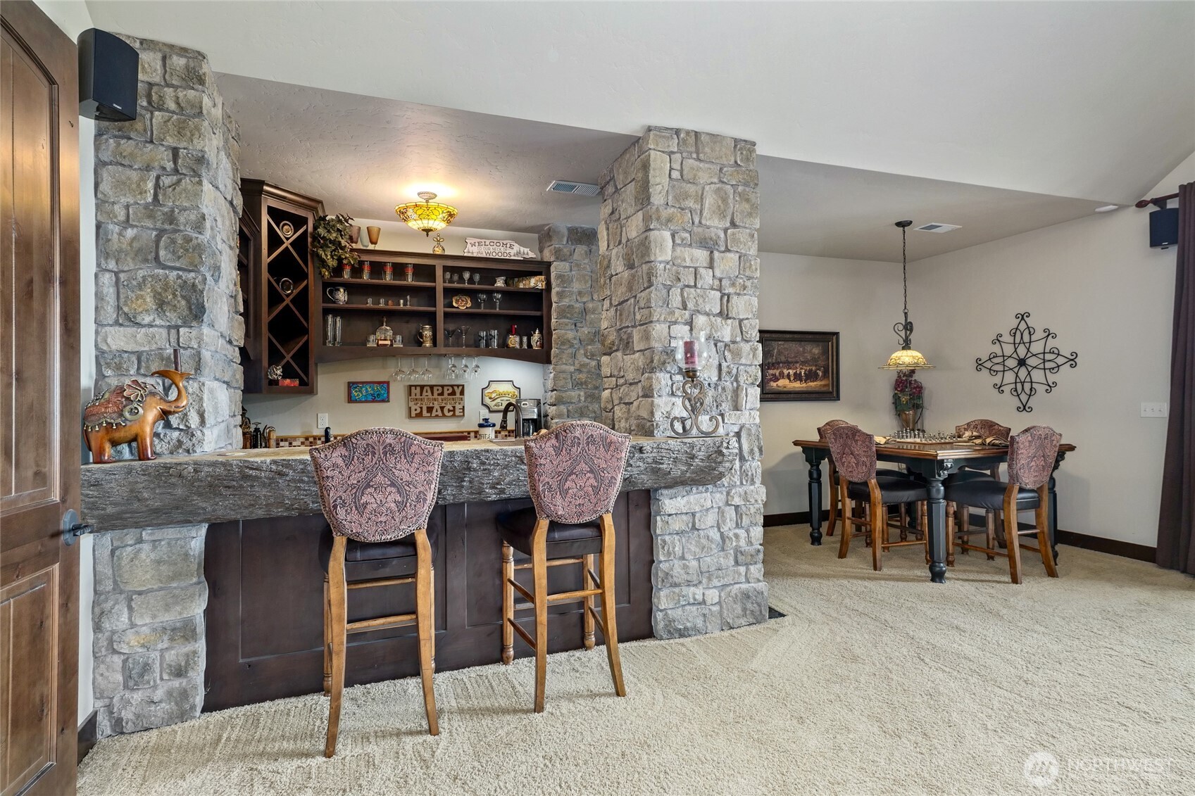 67 North Gilbertson Road Camano Island, WA 98282 - Photo 27 of 40 a view of a dining room with furniture