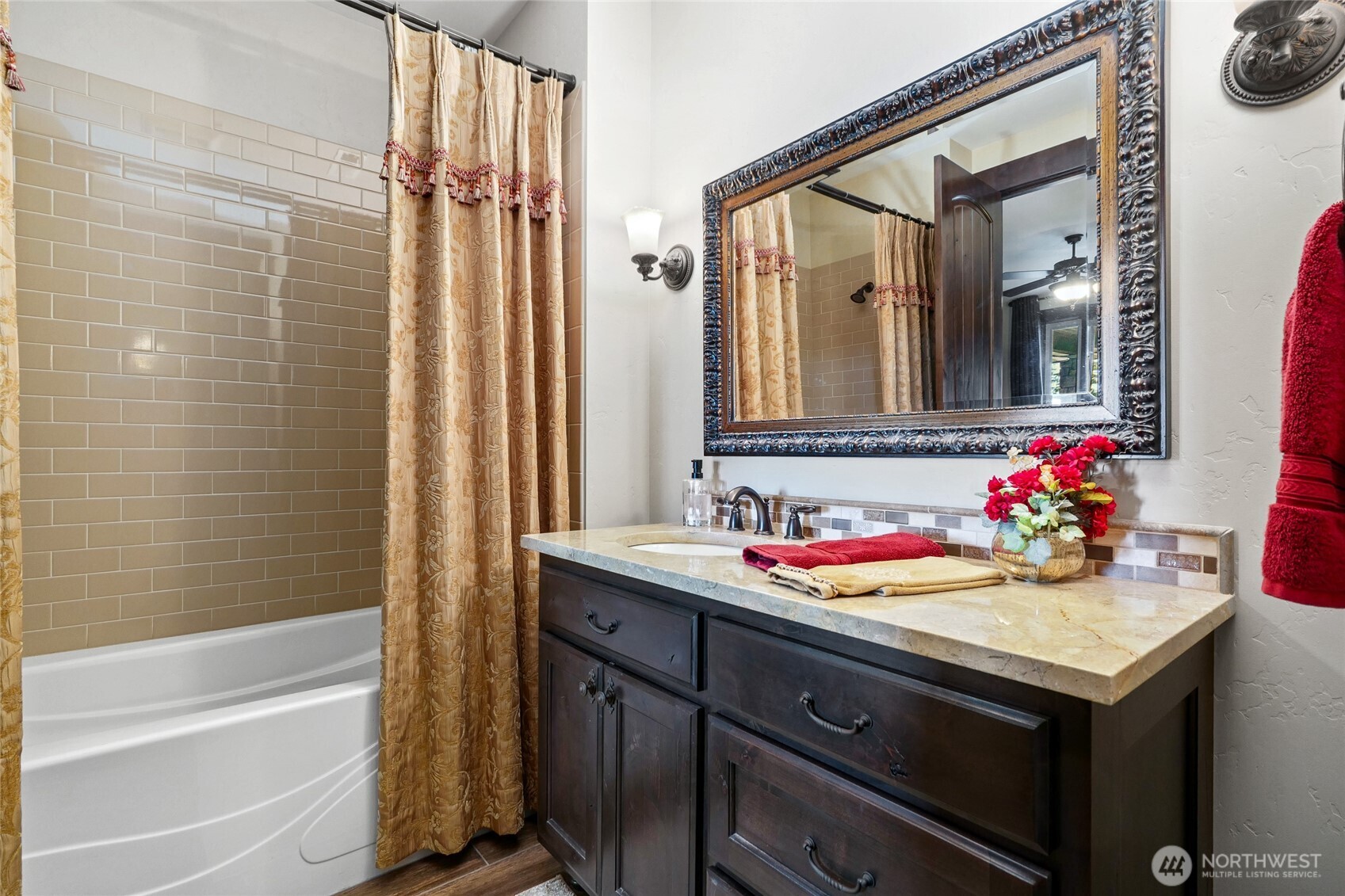 67 North Gilbertson Road Camano Island, WA 98282 - Photo 29 of 40 a bathroom with a sink vanity tub and shower