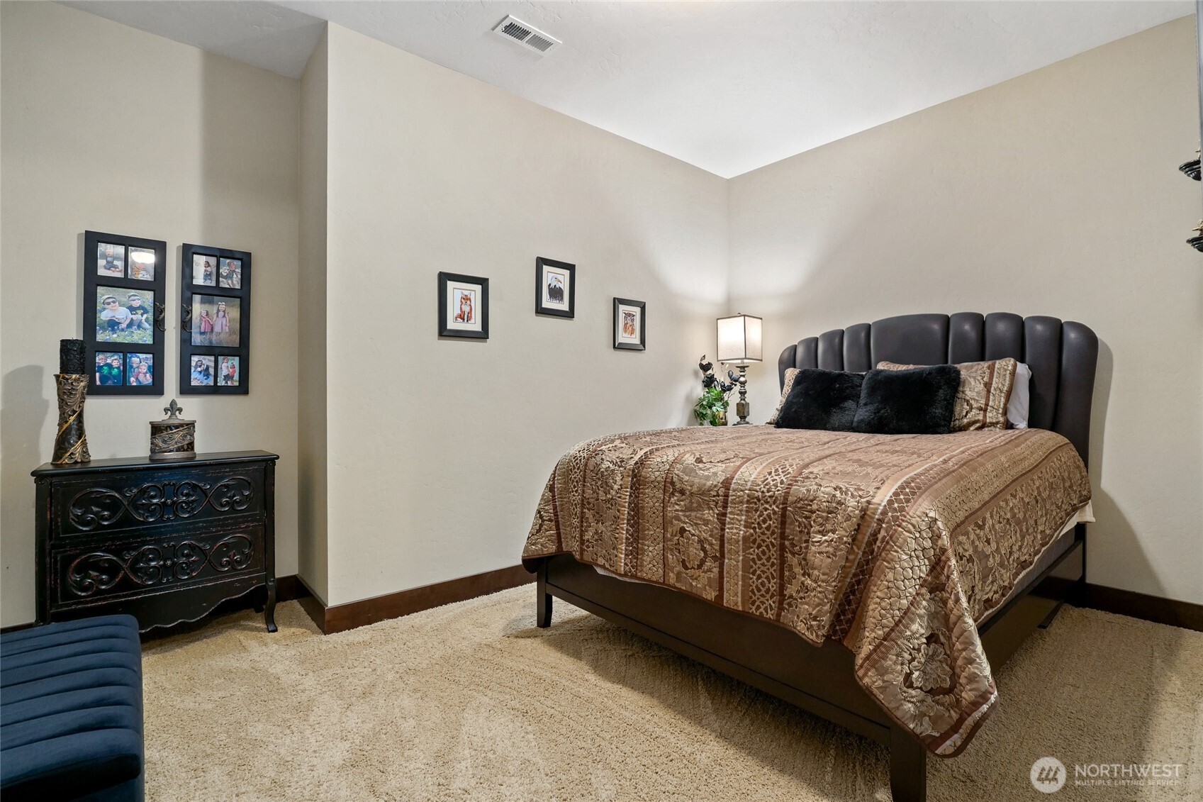 67 North Gilbertson Road Camano Island, WA 98282 - Photo 33 of 40 a bedroom with a bed and cabinets