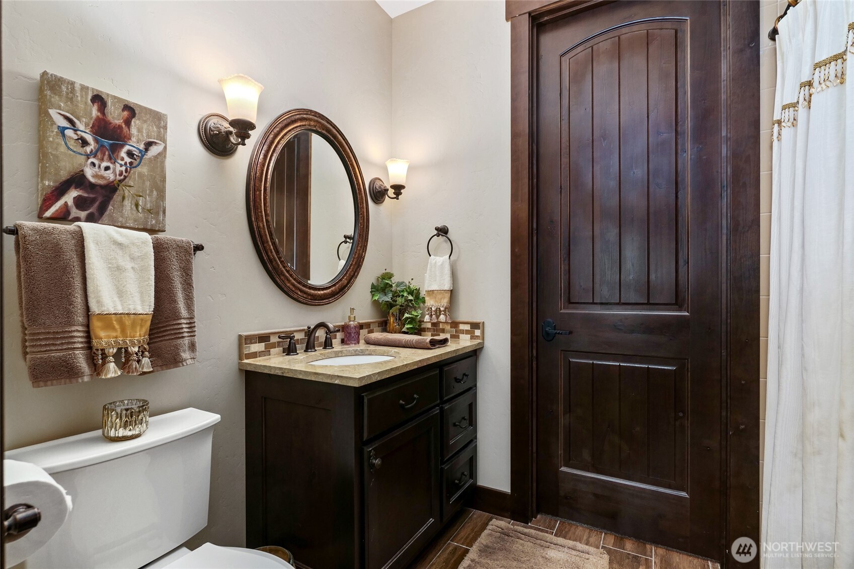 67 North Gilbertson Road Camano Island, WA 98282 - Photo 34 of 40 a bathroom with a sink and a mirror