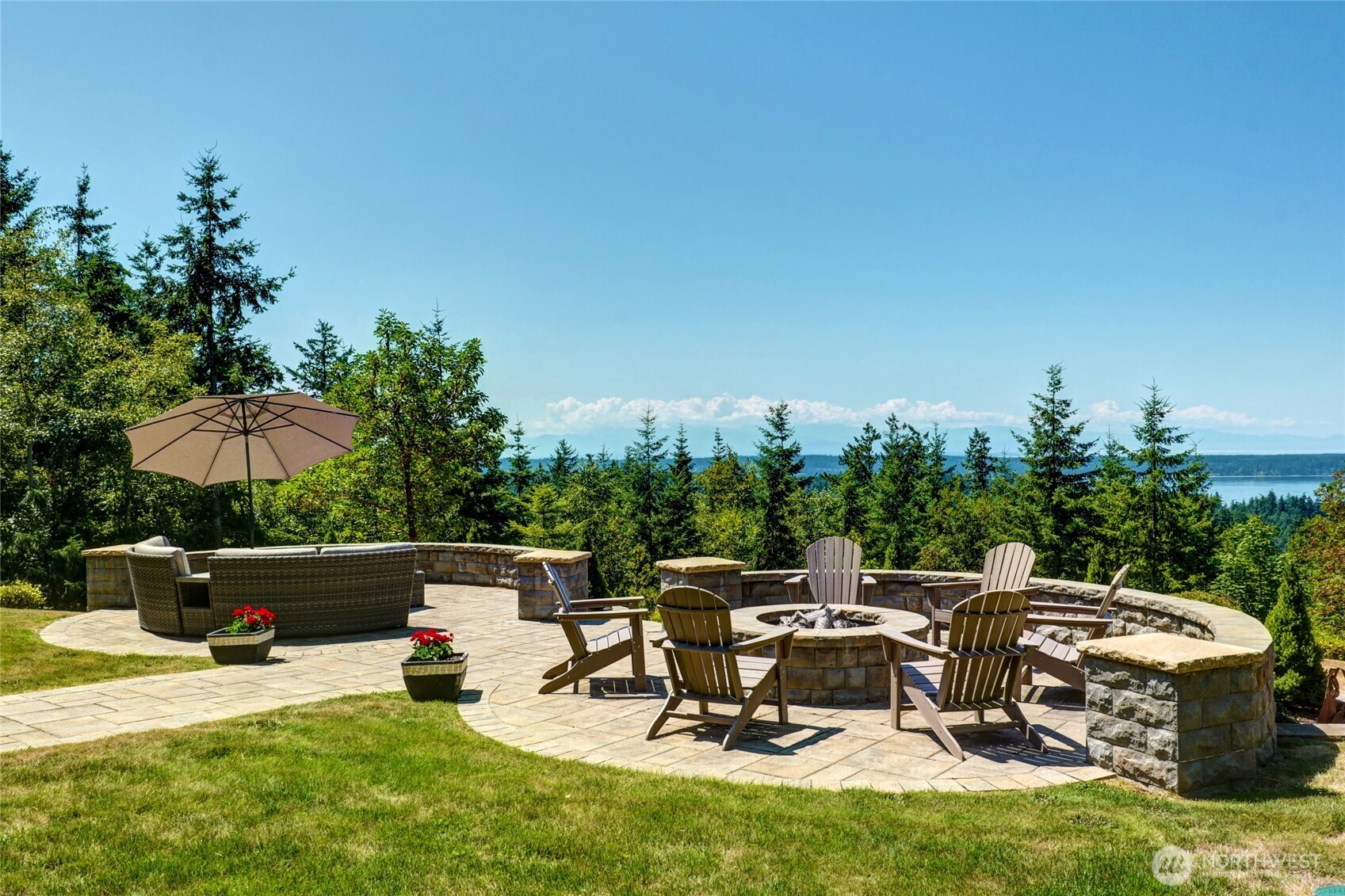 67 North Gilbertson Road Camano Island, WA 98282 - Photo 37 of 40 a view of backyard with seating area and trees