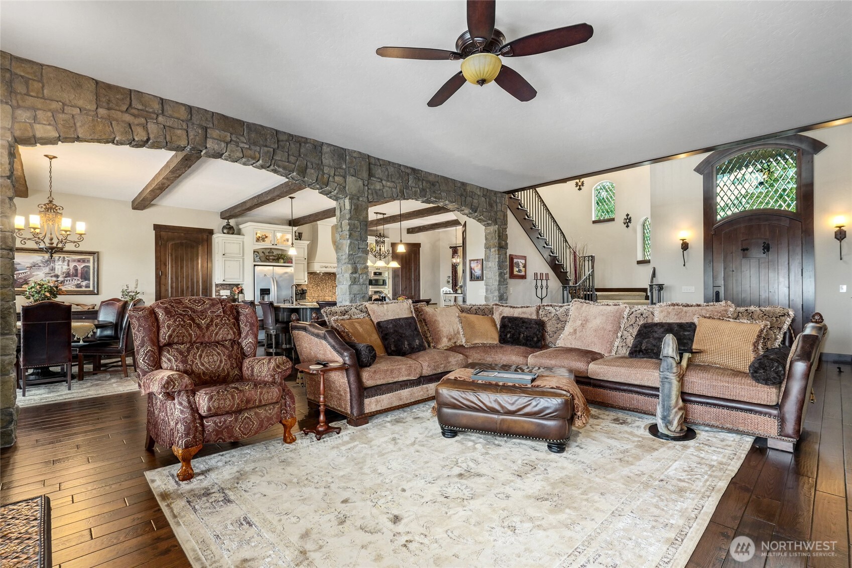 67 North Gilbertson Road Camano Island, WA 98282 - Photo 7 of 40 a living room with lots of furniture and wooden floor