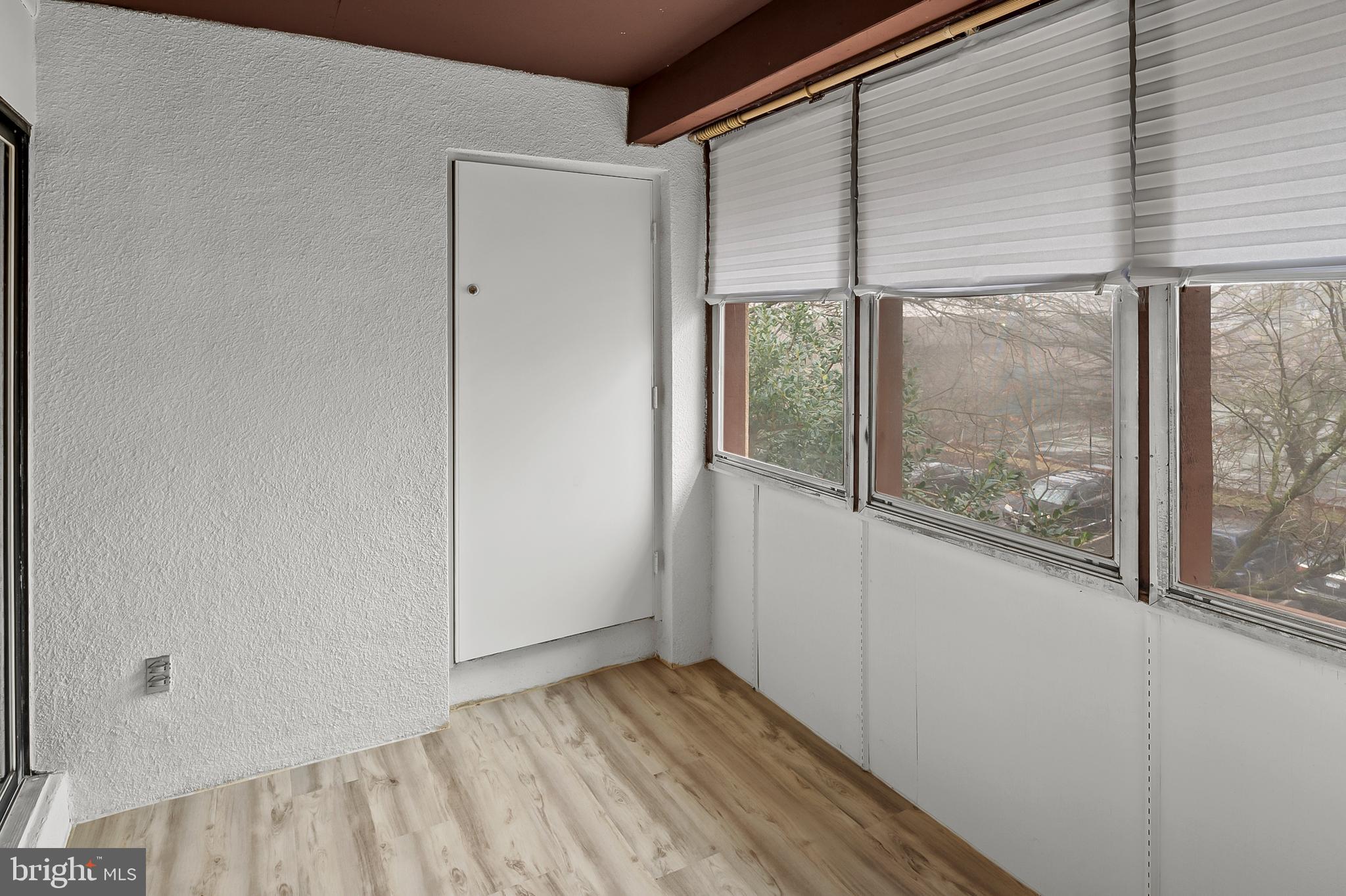5870 Thunder Hill Road, Unit C2 Columbia, MD 21045 - Photo 9 of 23 a view of an empty room and window