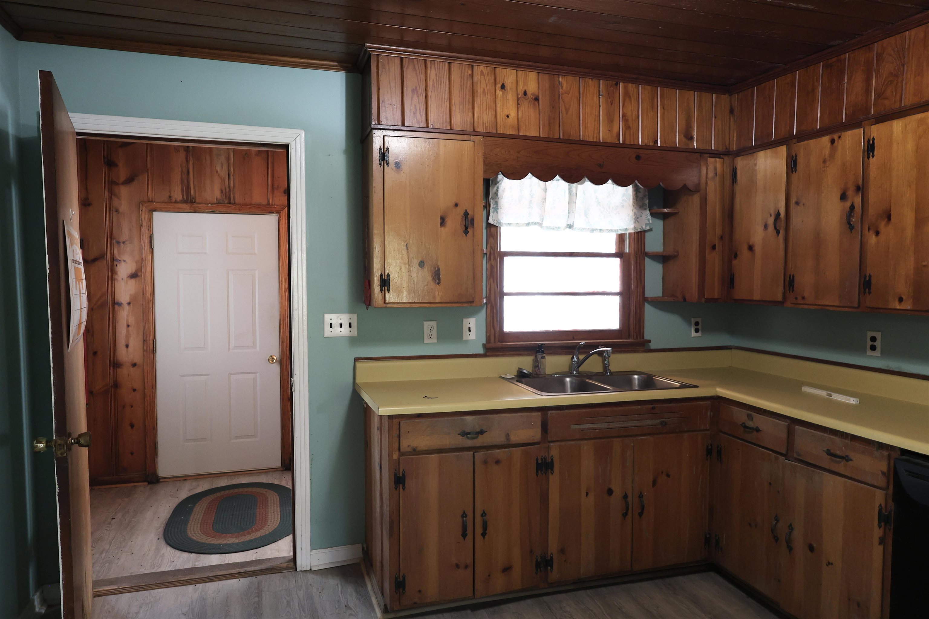 123 North Magnolia Street Adamsville, TN 38310 - Photo 12 of 25 a kitchen with a sink and a window