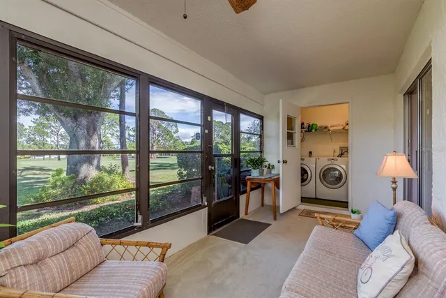 an aerial view of a house with a ocean view