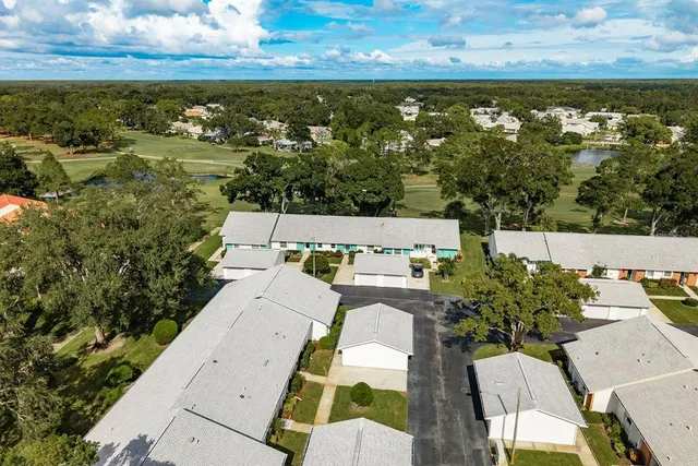 a view of a swimming pool with a patio