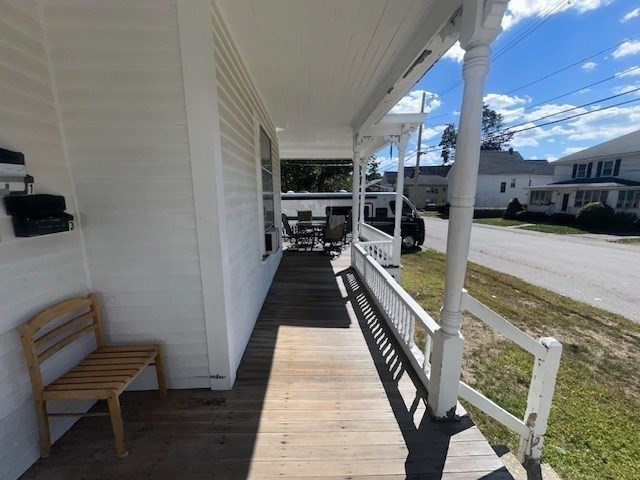 55 Cottage Street Hudson, MA 01749 - Photo 3 of 11 a view of a balcony with chairs