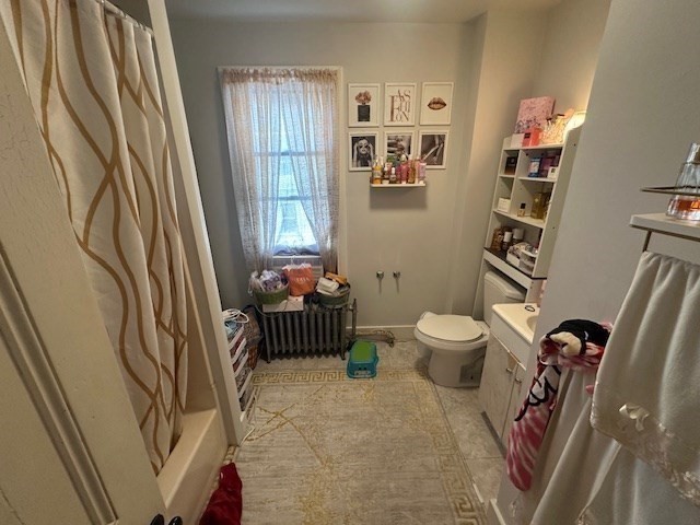 55 Cottage Street Hudson, MA 01749 - Photo 6 of 11 a room with furniture and a window