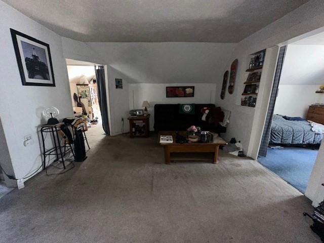 55 Cottage Street Hudson, MA 01749 - Photo 9 of 11 a living room with furniture and a flat screen tv