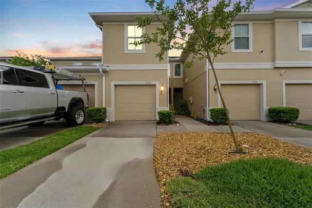 a house view with a garden space