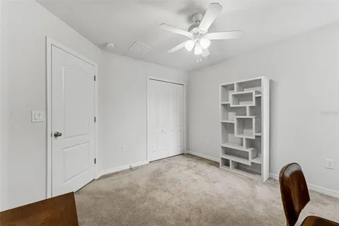 a bathroom with a sink a mirror and vanity