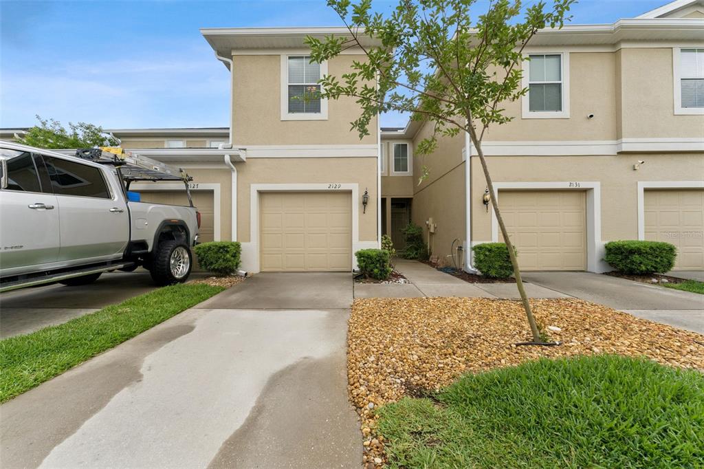 2129 Lennox Dale Lane Brandon, FL 33510 - Photo 3 of 38 a house view with a garden space