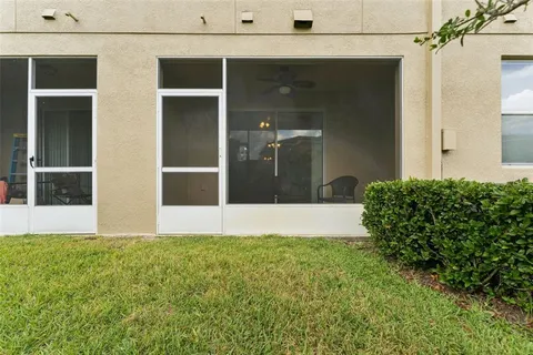 a view of house with yard