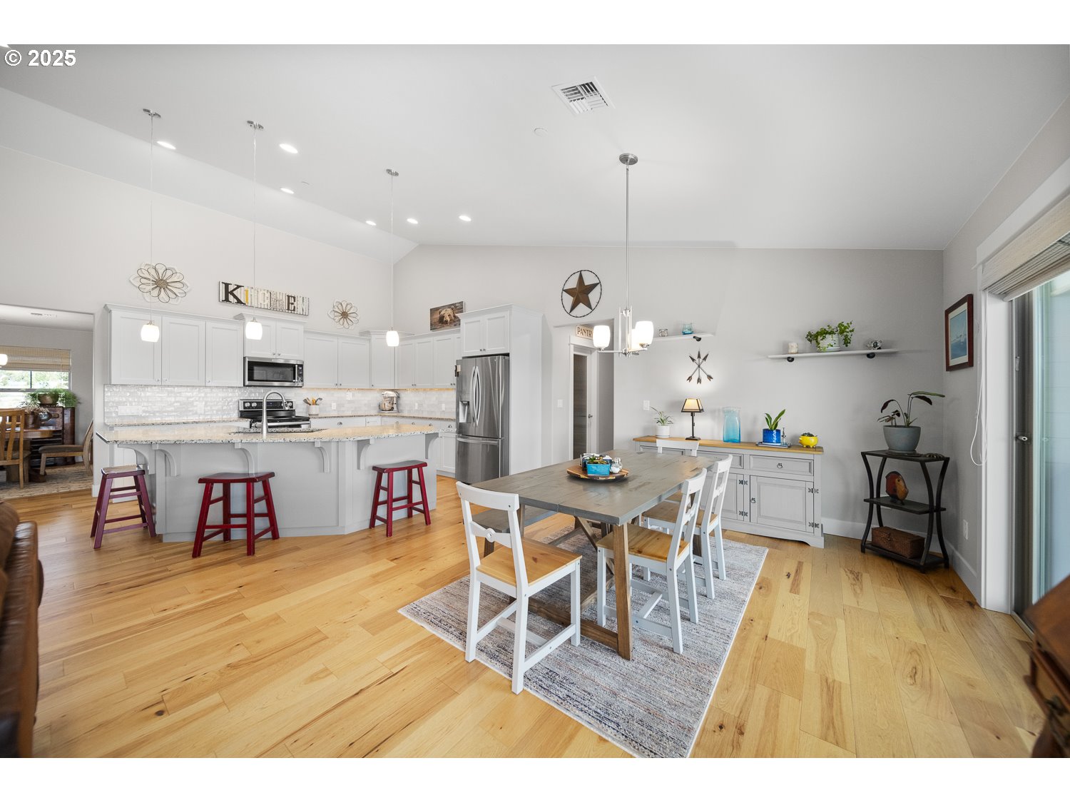 4416 Southeast Laredo Road Prineville, OR 97754 - Photo 14 of 36 a living room with lots of furniture and kitchen view