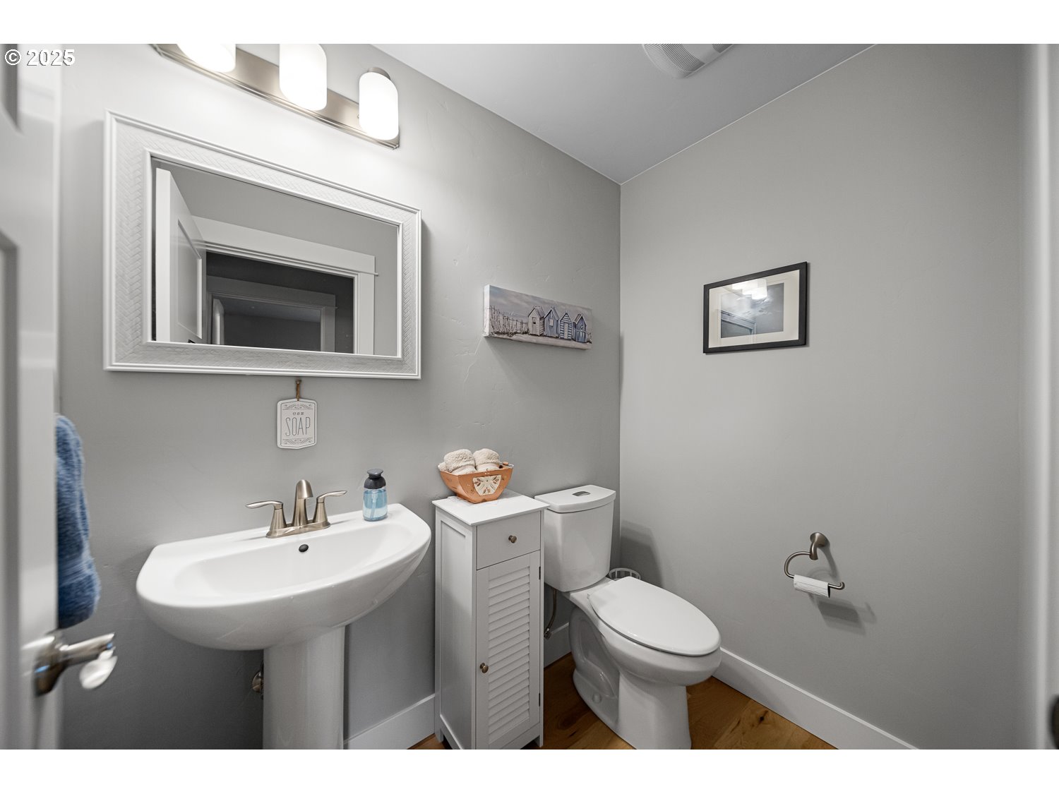 4416 Southeast Laredo Road Prineville, OR 97754 - Photo 22 of 36 a bathroom with a sink mirror and toilet