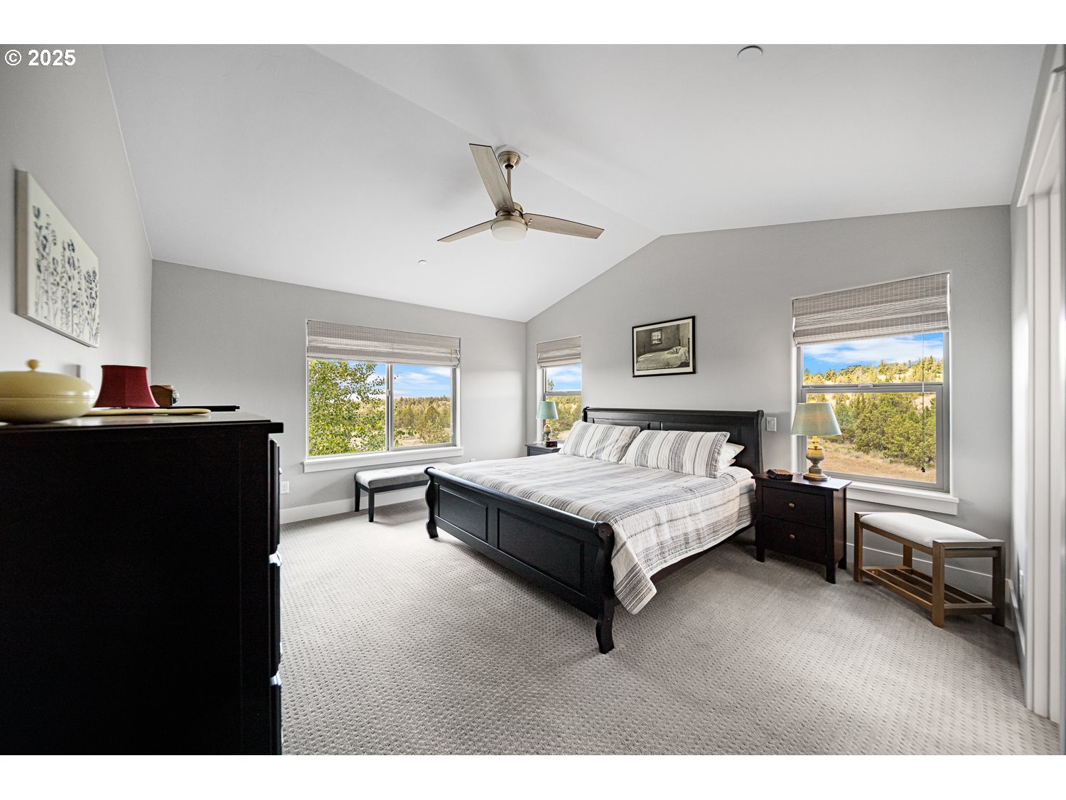 4416 Southeast Laredo Road Prineville, OR 97754 - Photo 23 of 36 a bedroom with a bed and a table in it