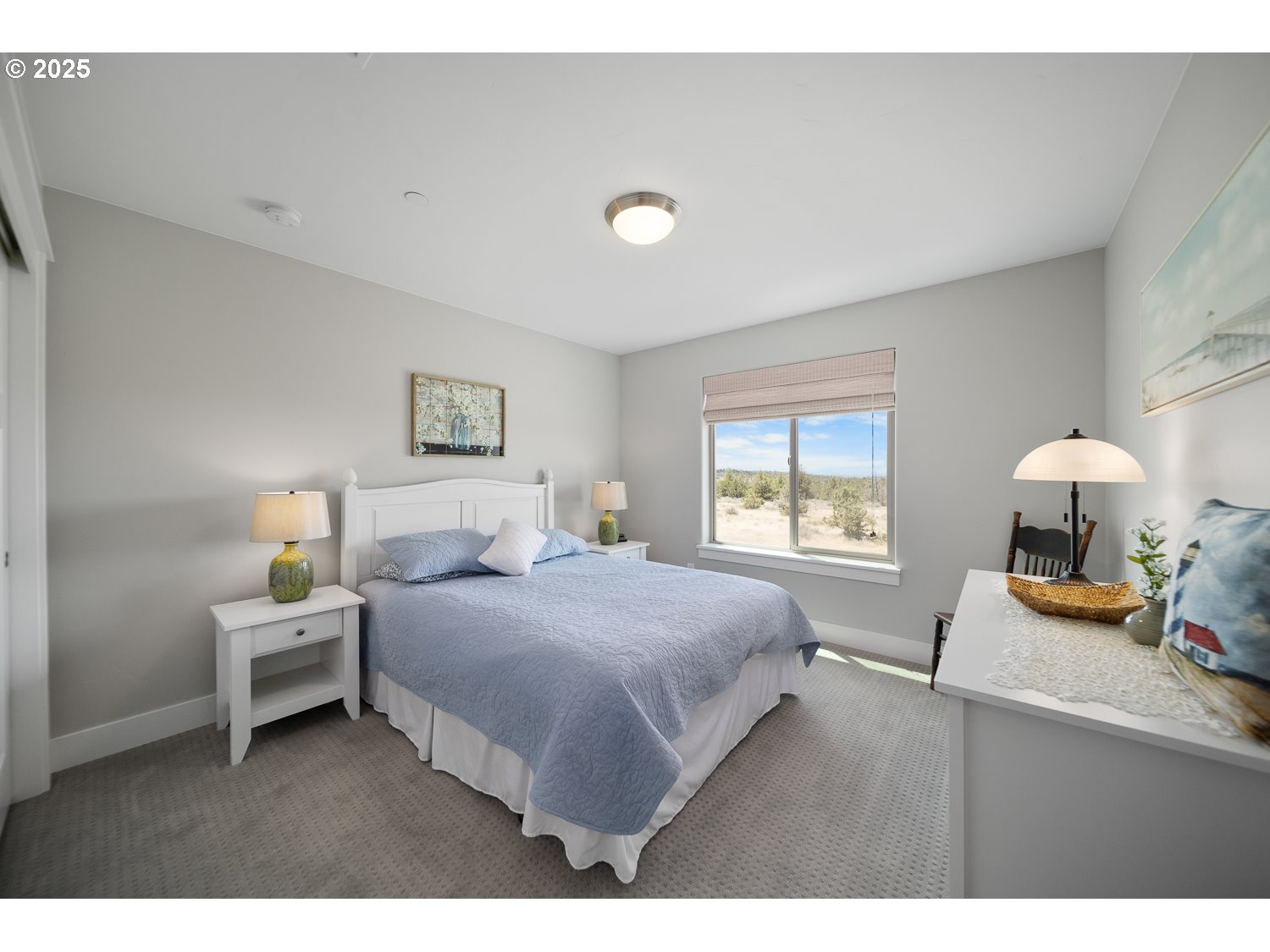 4416 Southeast Laredo Road Prineville, OR 97754 - Photo 32 of 36 a bedroom with a bed and a large window