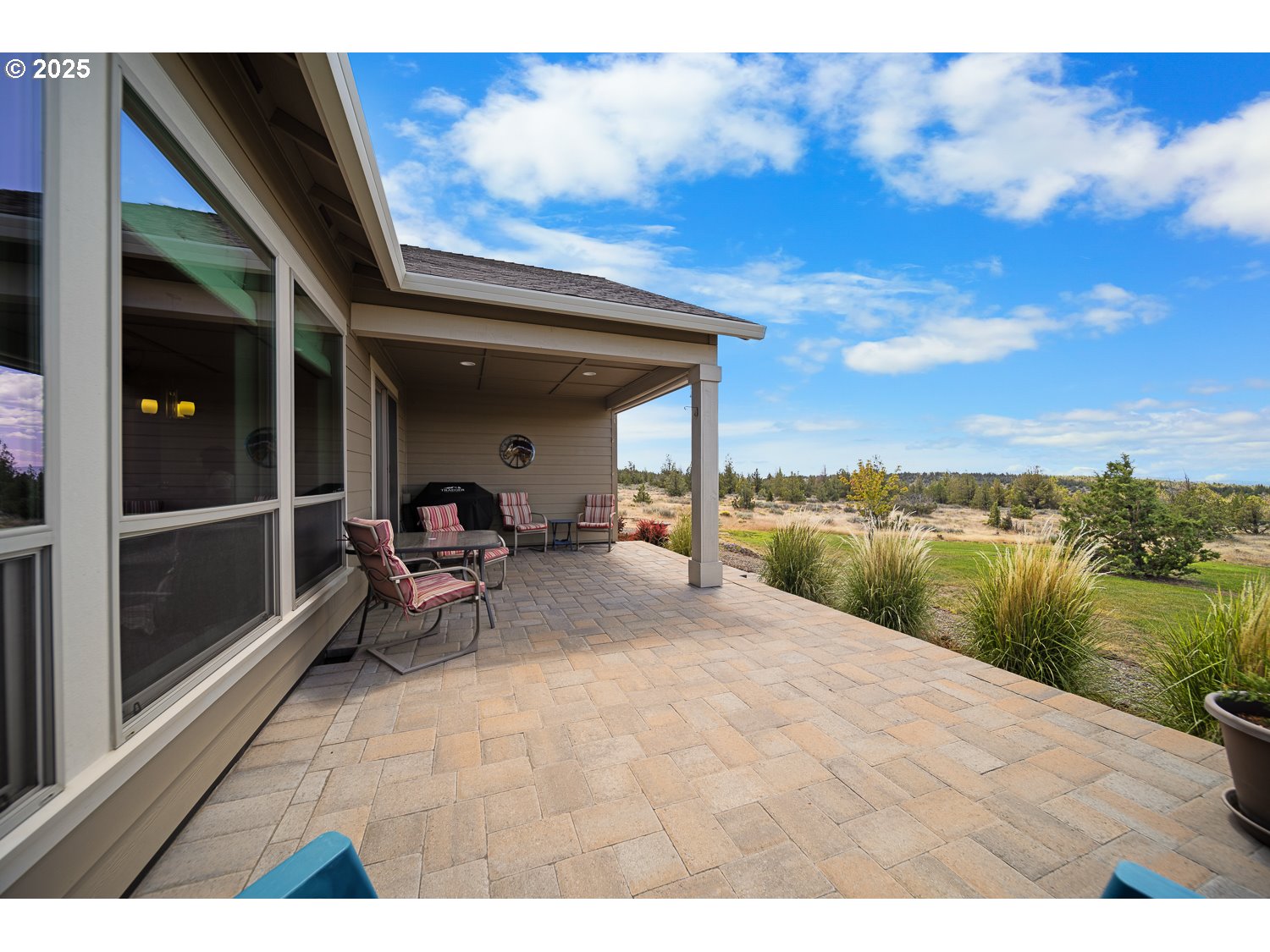 4416 Southeast Laredo Road Prineville, OR 97754 - Photo 34 of 36 a view of a swimming pool with a lounge chair
