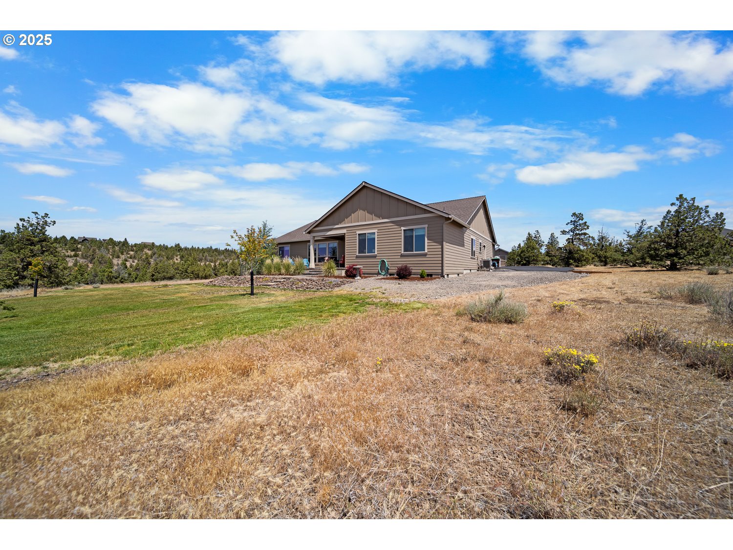 4416 Southeast Laredo Road Prineville, OR 97754 - Photo 35 of 36 a view of a house with a big yard