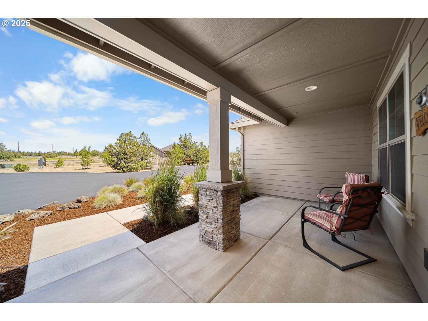 4416 Southeast Laredo Road Prineville, OR 97754 - Photo 5 of 36 a view of swimming pool with outdoor seating and plants