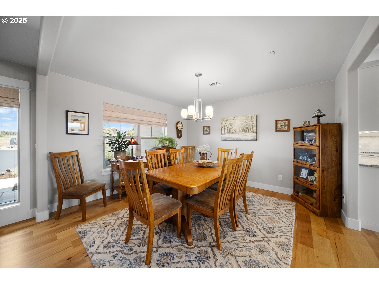 4416 Southeast Laredo Road Prineville, OR 97754 - Photo 7 of 36 a view of a dining room with furniture and wooden floor