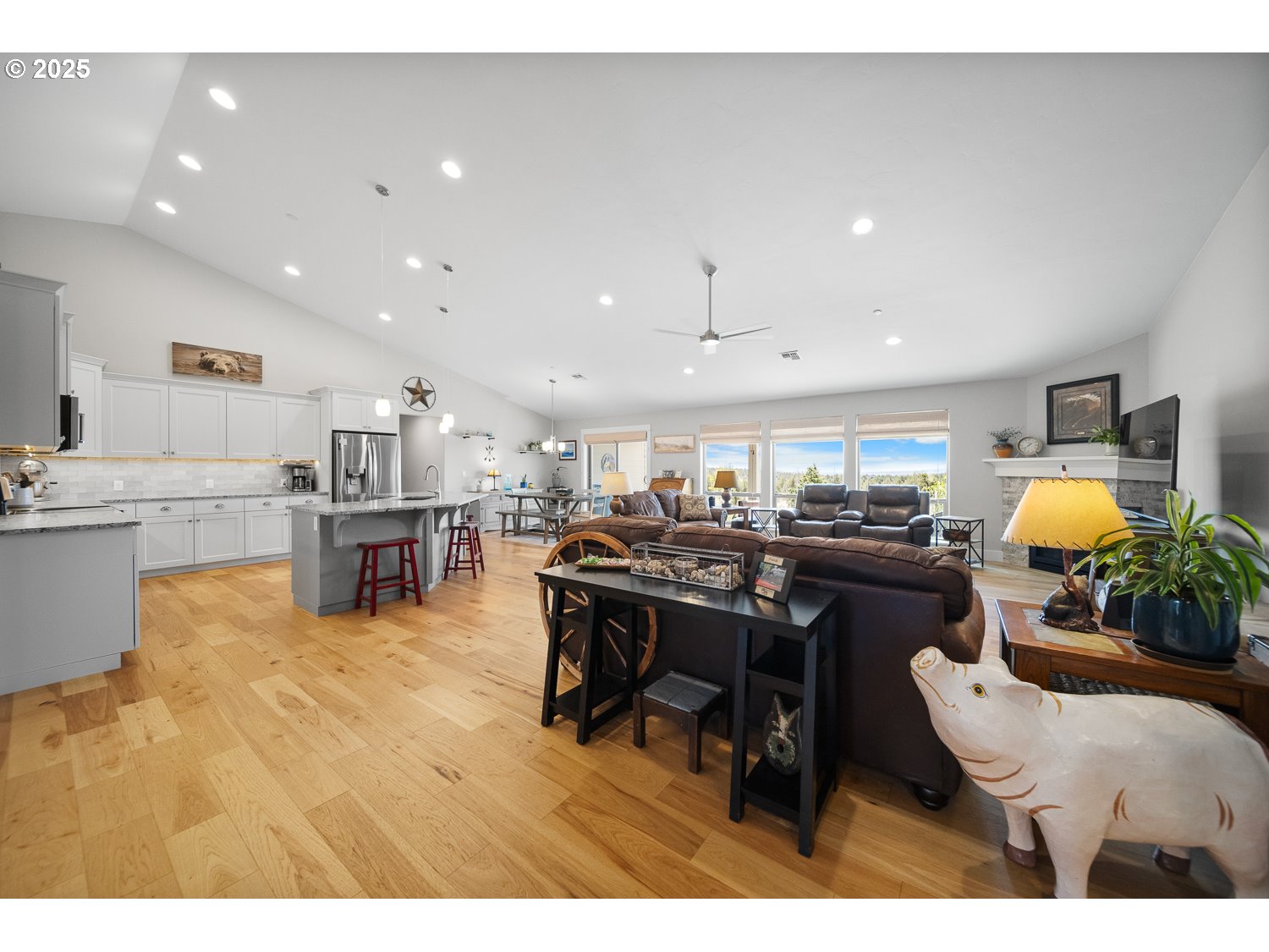 4416 Southeast Laredo Road Prineville, OR 97754 - Photo 10 of 36 a living room with lots of furniture and kitchen view