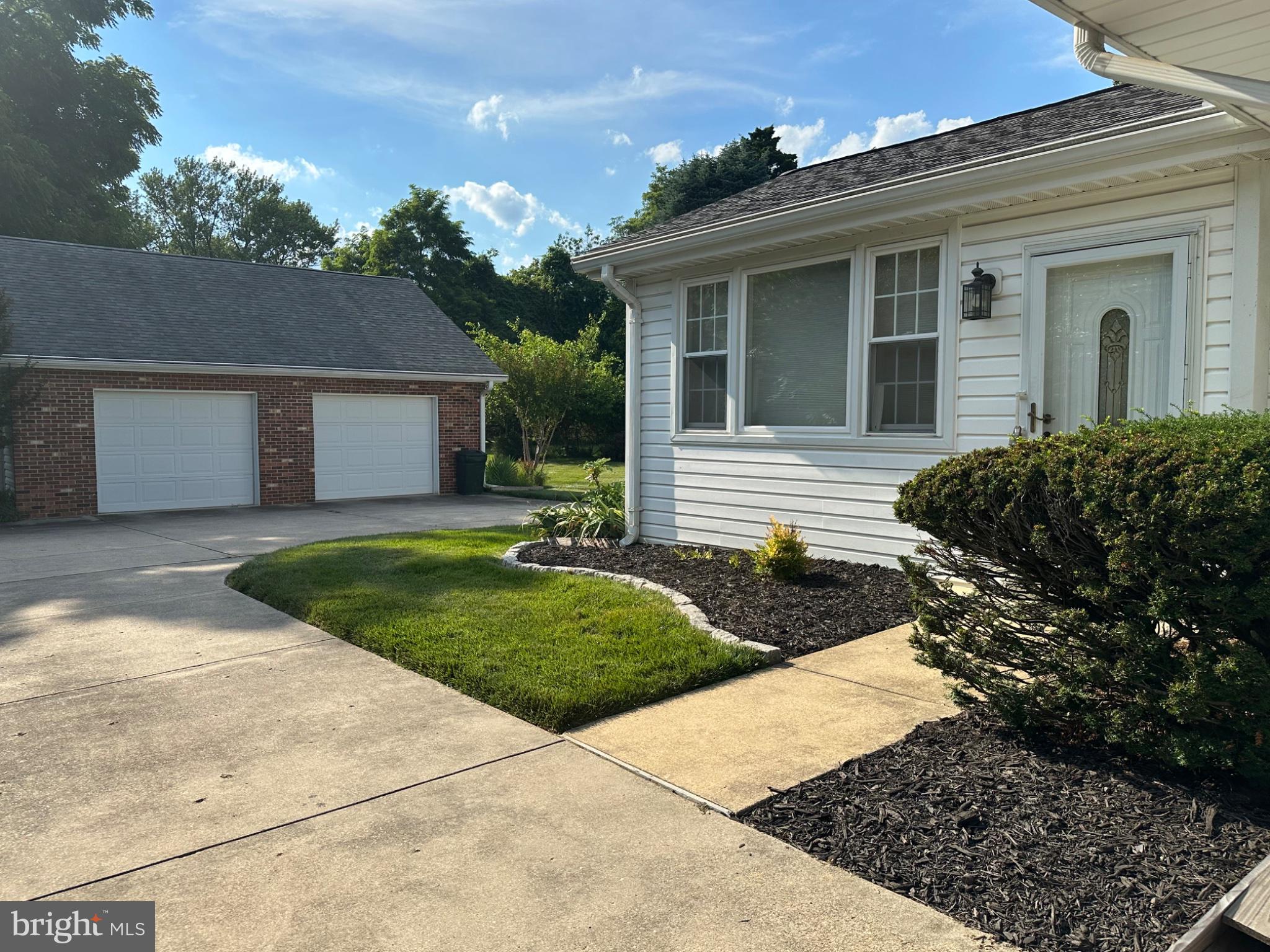 14616 Sturtevant Road Silver Spring, MD 20905 - Photo 3 of 44 Charming curb appeal with lush greenery.