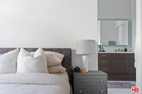 a bed room with a bed and a couch