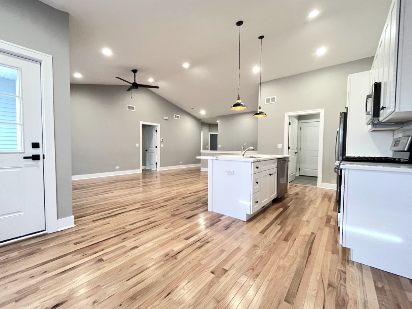 970 Partridge Circle Marengo, IL 60152 - Photo 5 of 17 a large kitchen with a lot of counter space and a wooden floor