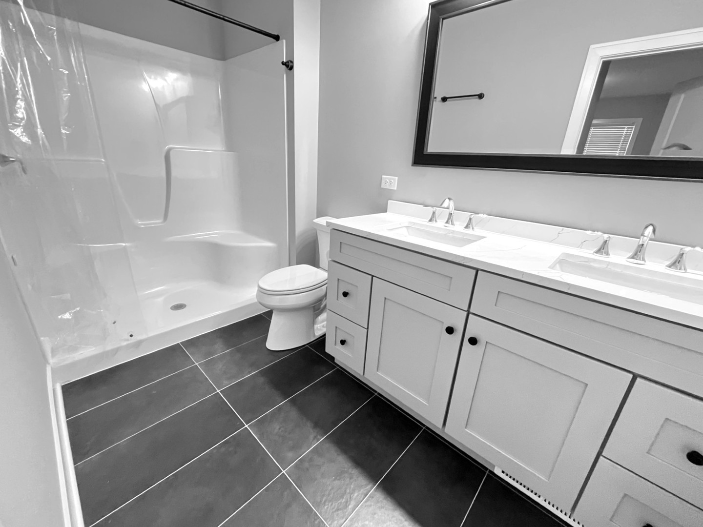 970 Partridge Circle Marengo, IL 60152 - Photo 7 of 17 a bathroom with a double vanity sink mirror and toilet