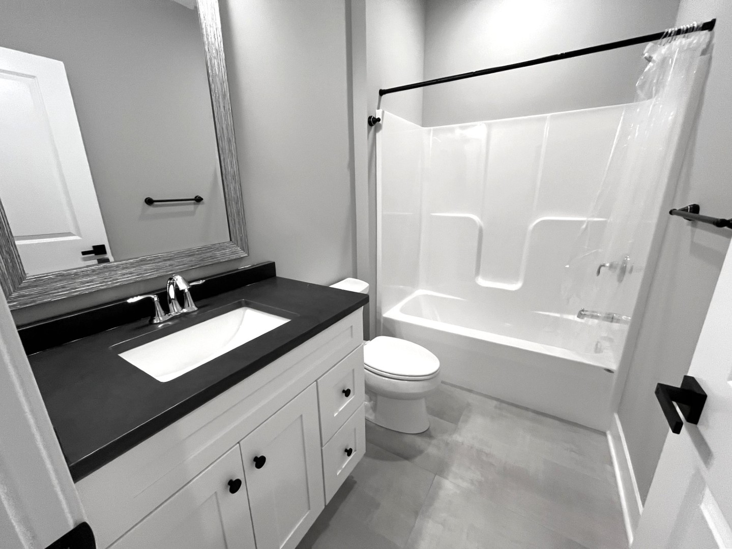 970 Partridge Circle Marengo, IL 60152 - Photo 8 of 17 a bathroom with a sink a toilet and a mirror