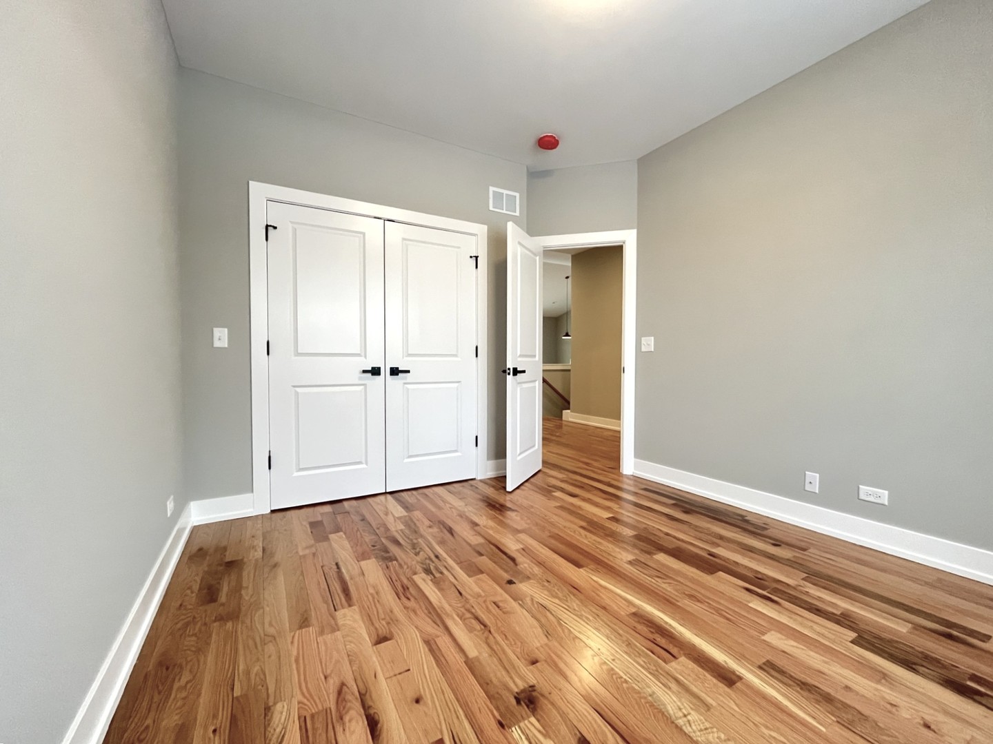 970 Partridge Circle Marengo, IL 60152 - Photo 10 of 17 a view of a room with wooden floor and white doors