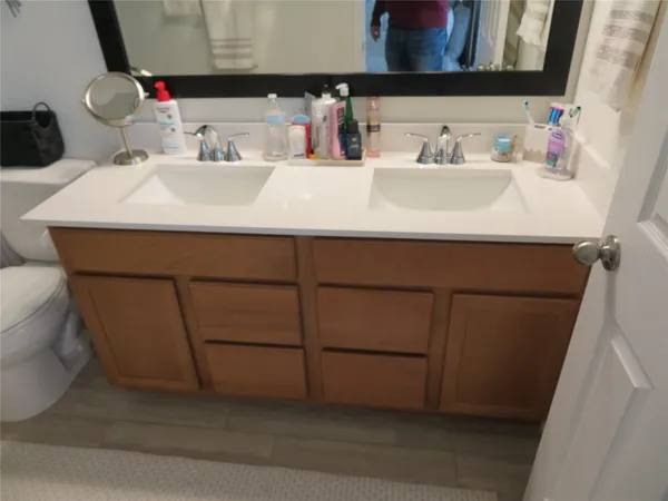 a bathroom with a sink and a mirror