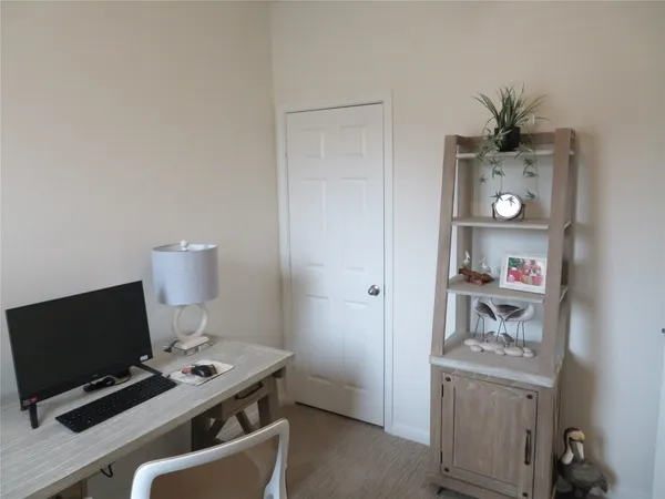 a workspace with furniture and wooden floor
