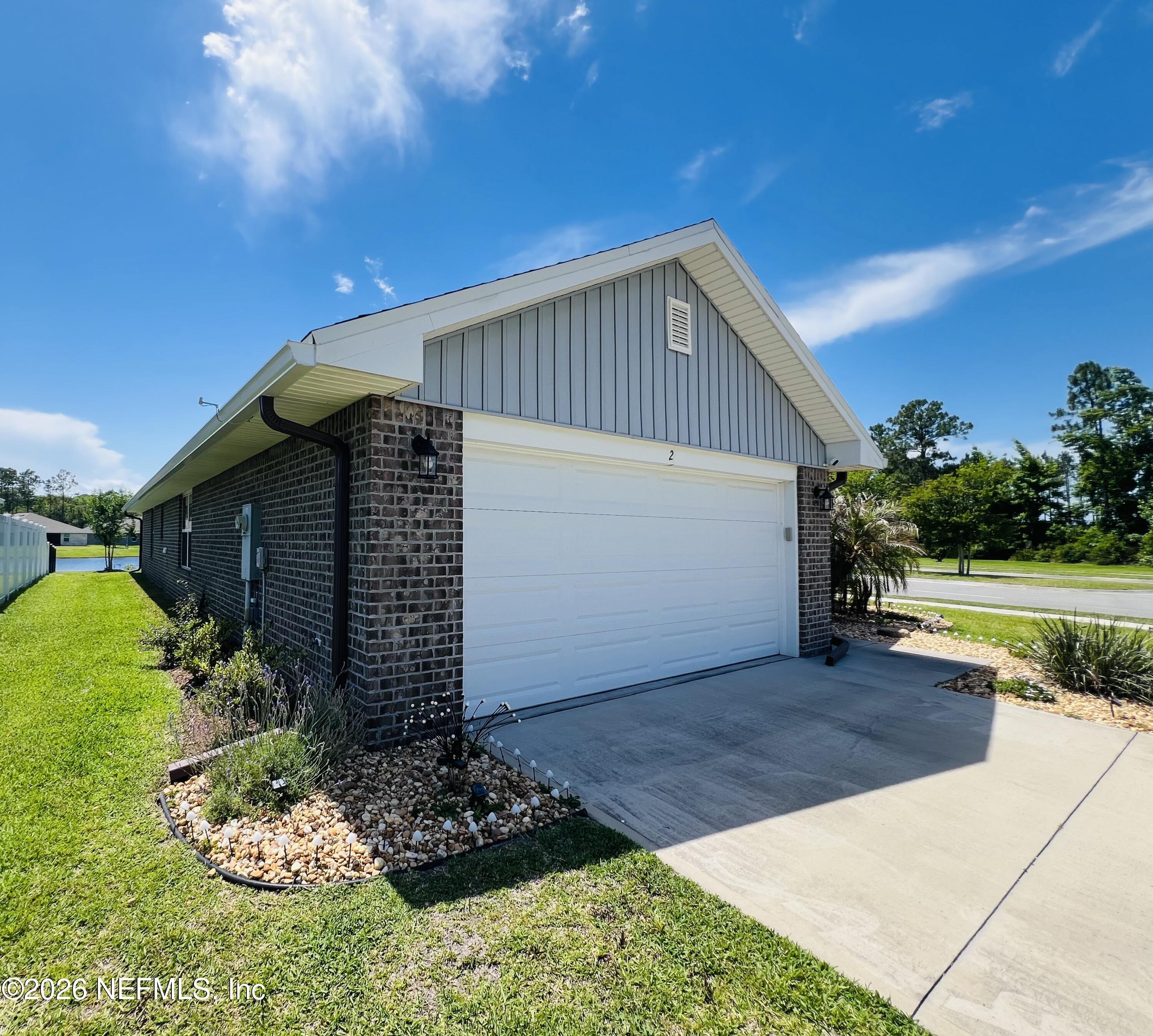 2 Rivertown Road Palm Coast, FL 32137 - Photo 3 of 80 a view of a house with a patio