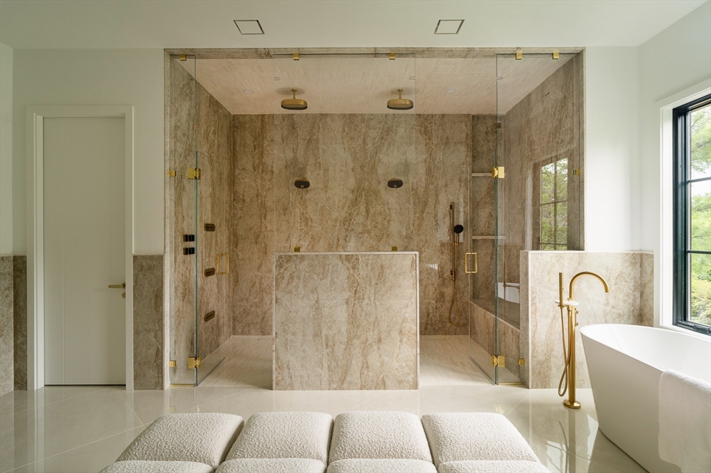 19 Bonnybrook Road Newton, MA 02468 - Photo 27 of 42 a bathroom with a shower and a tub