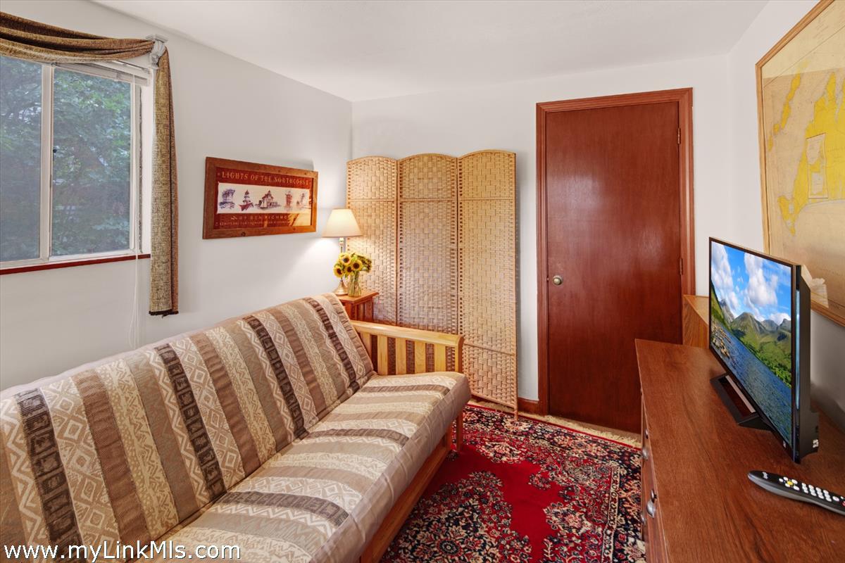 9 Galway Road Vineyard Haven, MA 02568 - Photo 21 of 26 a living room with furniture and a flat screen tv