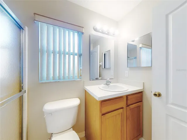 a view of a house with pool and yard with swimming pool