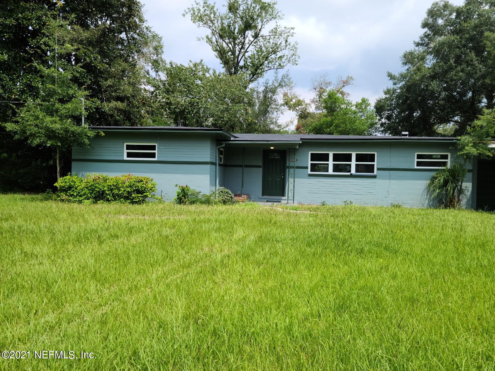 10506 Villanova Road Jacksonville, FL 32218 - Photo 1 of 1 a front view of house with yard and green space