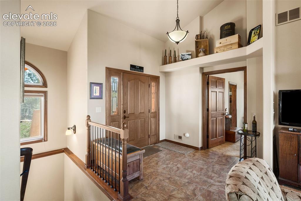 131 Paradiso Road Divide, CO 80814 - Photo 11 of 50 a living room with furniture and a flat screen tv