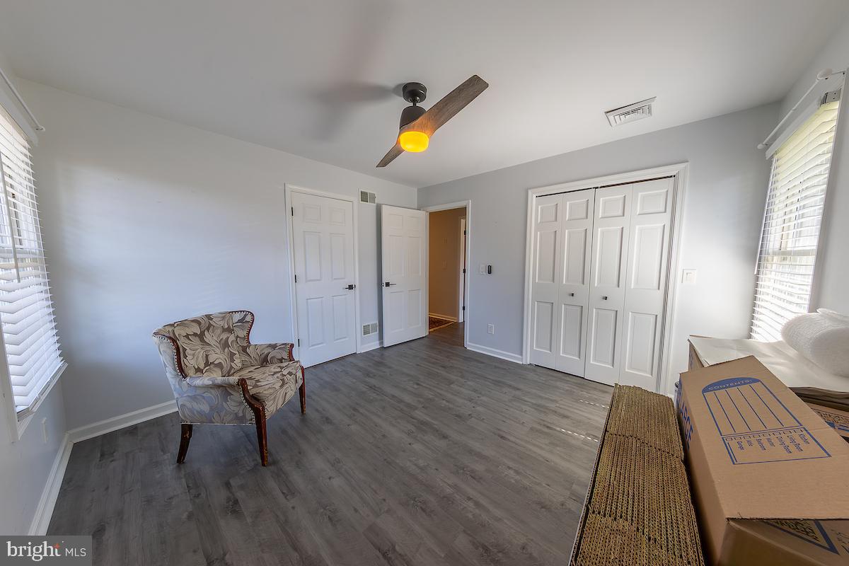 22 Arnell Road Rehoboth Beach, DE 19971 - Photo 16 of 22 a view of a workspace with furniture and wooden floor