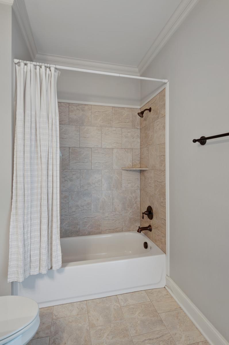 460 Truman Road West Franklin, TN 37064 - Photo 13 of 24 You will love the tile surround on the tubs.
