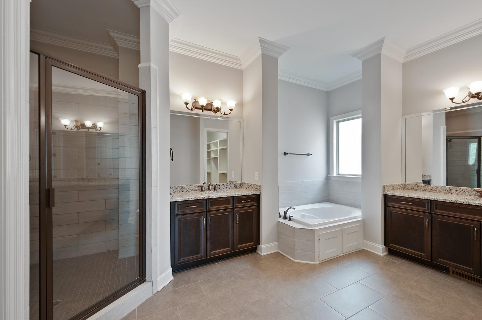 460 Truman Road West Franklin, TN 37064 - Photo 9 of 24 Large master Bathroom with separate sinks, tiled shower, separate tub.