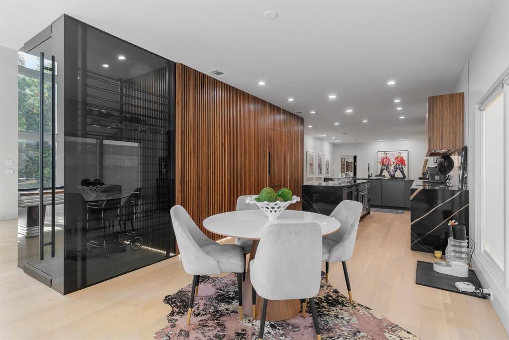 3731 Gilbert Avenue, Unit 3 Dallas, TX 75219 - Photo 8 of 40 a view of a dining room with furniture
