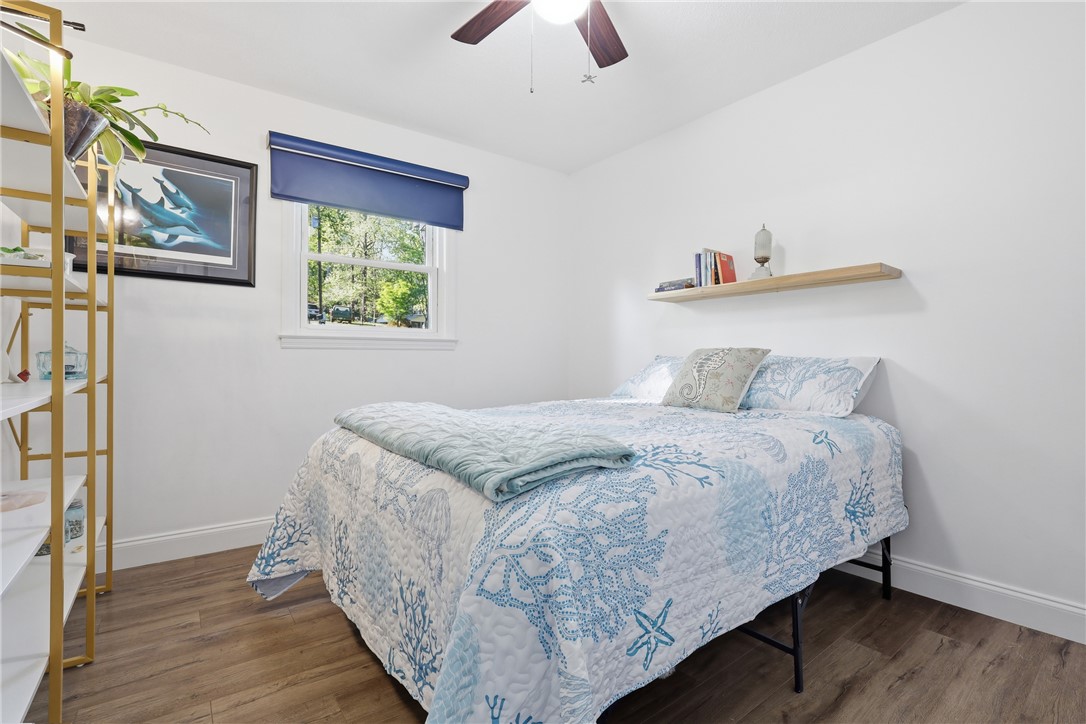 623 West Springwood Drive Seneca, SC 29672 - Photo 14 of 50 This cozy bedroom features durable flooring and ample natural light, perfect for restful nights.