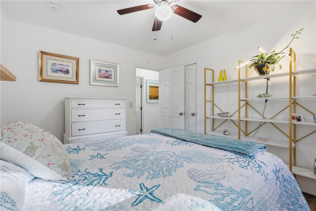 623 West Springwood Drive Seneca, SC 29672 - Photo 15 of 50 This cozy bedroom offers a serene escape with bright finishes and practical storage solutions.